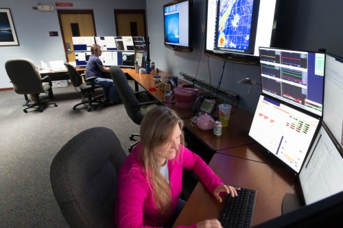 Credit: Joy Pollard, Gemini/AURA; Associate Scientist Kathy Roth in the Hilo Base Facility collecting data for that night’s observations.