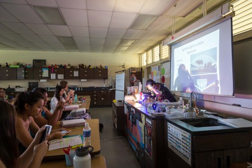 Thirty Meter Telescope-Japanʻs Yutaka Hayano demonstrates spectroscopy for students at Hilo High School.