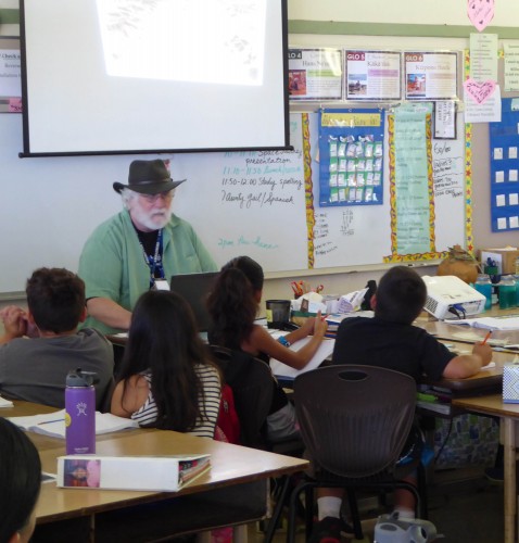 NASA Scientist Brian Day engages 4th grade students with rocks from Mars.