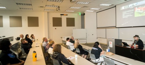 NASA SSERVI Astronomer Brian Day (right) lectured about the prevalence of Near Earth Asteroids (NEA), their past history of devastating impact on the Earth, and what we can do about them in the future.