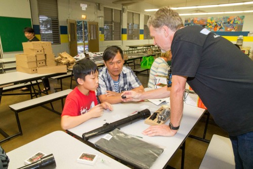 Gemini PIO staff Peter Michaud (right) checked this groupʻs eyepiece and made sure the lenses were correctly oriented.
