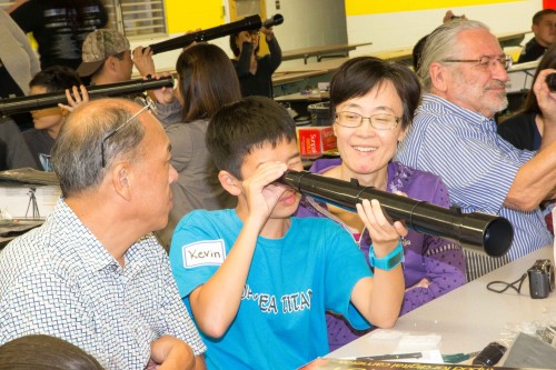 Once the eyepieces are made, itʻs just a simple matter of sliding them into the Galileoscope before testing out their magnifying power!