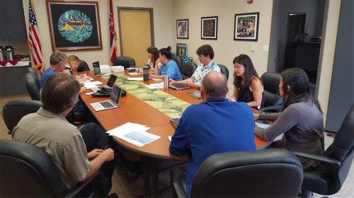 Mentors, teachers, and observatory staff discussing the pilot program.