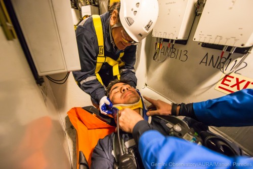 General Mechanic Supervisor of the Technician and Engineering group at the European Southern Observatory (ESO), Bernardo Ahumada, and Cerro Tololo Electric technician Nelson Ogalde, during a rescue simulation inside the Mirror Cell, as part of the training in confined spaces.