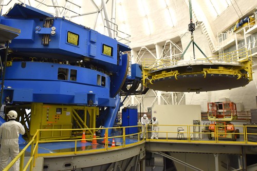 The 8.1 meter primary mirror suspended in the 4th floor, before going down to the stripping area in the first floor of the observatory building.