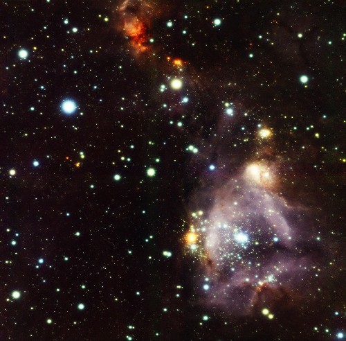Gemini South GeMS/GSAOI near-infrared image of the N159W field in the Large Magellanic Cloud. The image spans 1.5 arcminutes across, resolves stars to about 0.09 arcseconds, and is a composite of three filters (J, H, and Ks). In this view north is down and east is right .