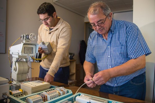 Gemini's Assistant Engineer Francisco Meza and Electronics Technician Herman Diaz, are working on Cloud cameras & Fog weather sensors control box, which are part of the Environmental monitoring Work-package within the BFO project at Gemini South.